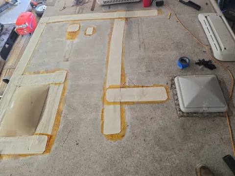 Here as you can tell we now have the 6 inch stripping done around all the seams where we sliced it all open to roll it back to do the repair to the decking and then around the skylight Believe it or not we do stand behind this but it's not gonna leak when we're done This would have been a $10,000 job all day long with everything that had to be done so even when a unit is it worth putting that kind of money in we can still do a repair in most cases